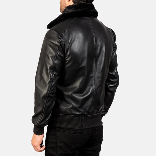 Black leather jacket worn by a person on a white background