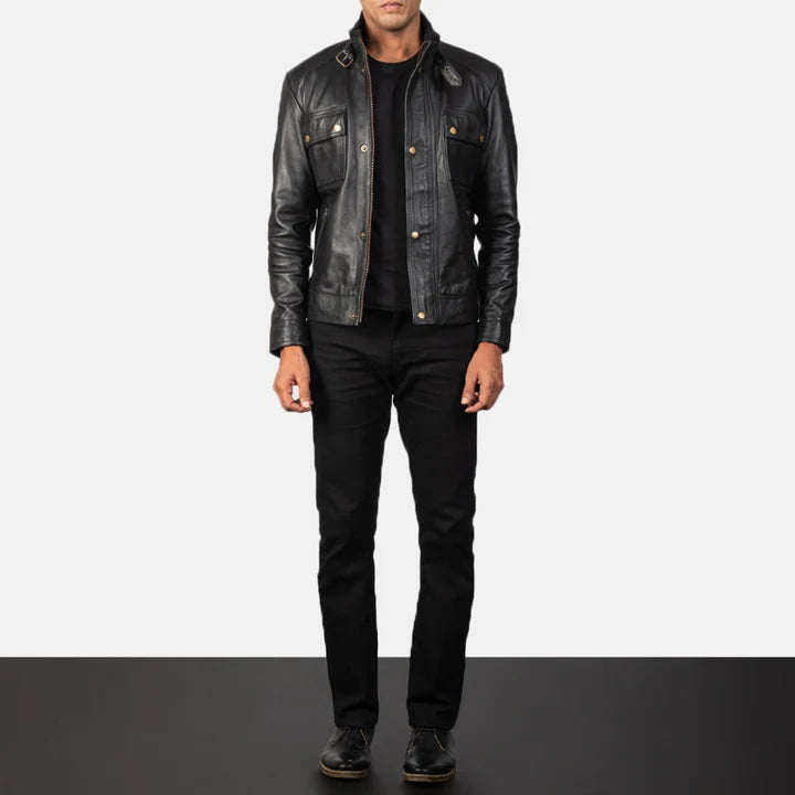 Person wearing a black leather jacket and pants on a white background