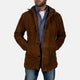 Man wearing a brown hooded jacket over a checkered shirt on a white background