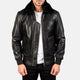 Man wearing a black leather jacket with fur collar on a white background