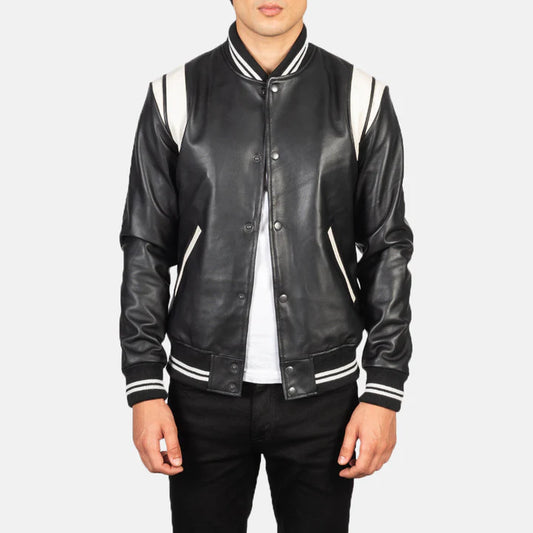 Black leather varsity jacket with white accents on a plain background