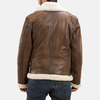 Brown leather jacket with white fur lining on a plain background