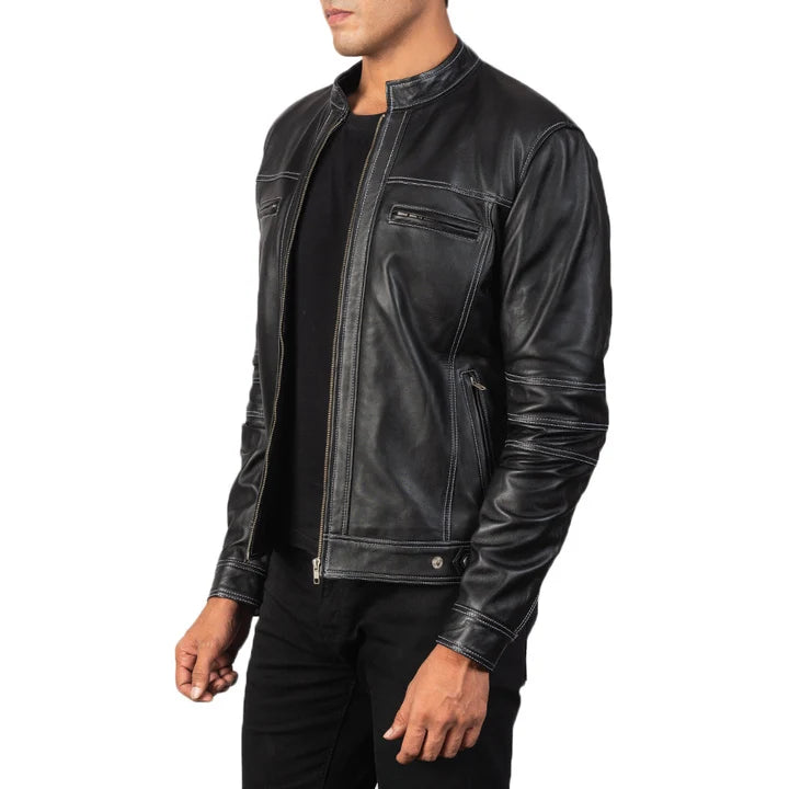Black leather jacket worn by a person on a white background