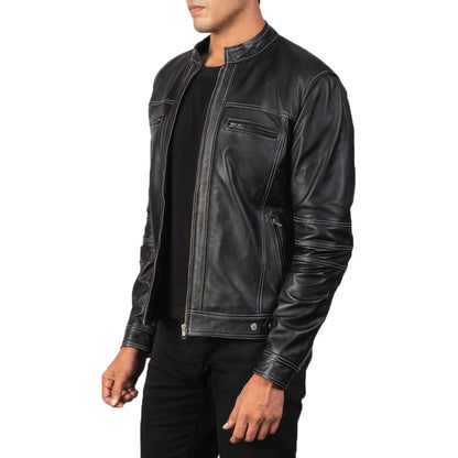 Black leather jacket worn by a person on a white background