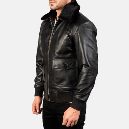 Black leather jacket with fur collar on a white background