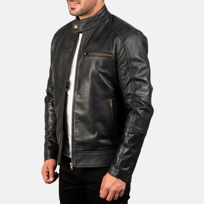 Black leather jacket worn by a person on a white background
