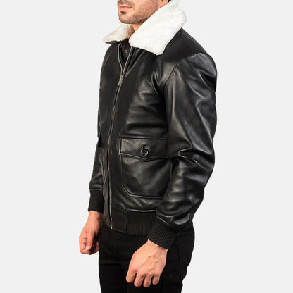 Black leather jacket with white fur lining on a plain background