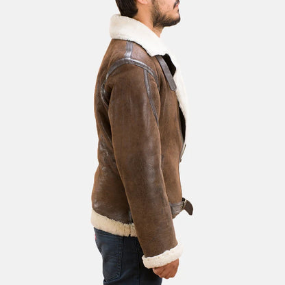 Brown shearling jacket with white fur lining worn by a person on a white background