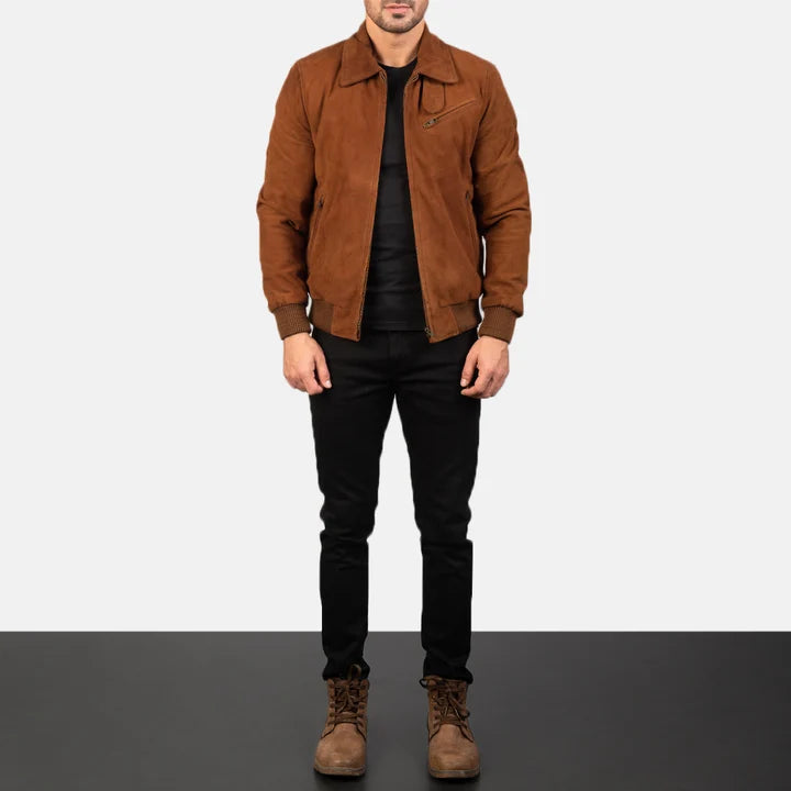 Man wearing a brown suede jacket, black pants, and brown boots on a white background