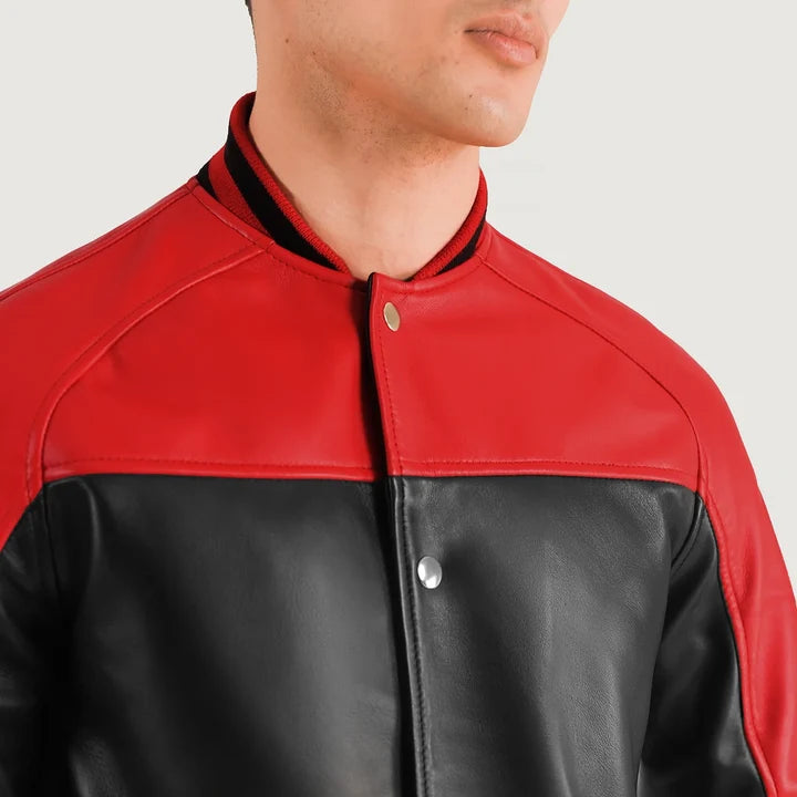 Red and black leather jacket on a plain background