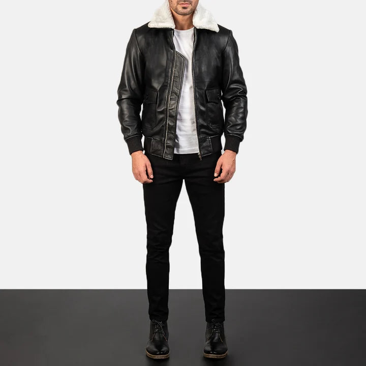 Man wearing a black leather jacket with shearling lining on a white background