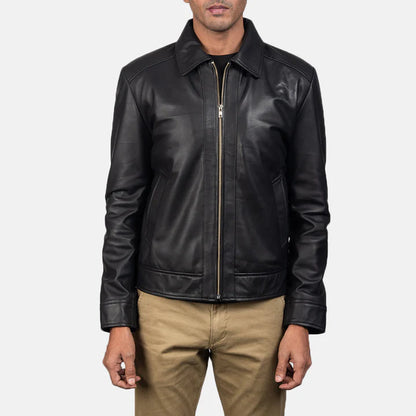 Black leather jacket worn by a person on a white background