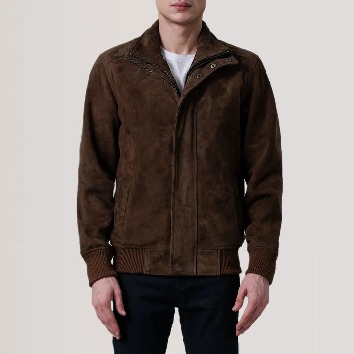 Brown suede jacket worn by a person on a light pink background