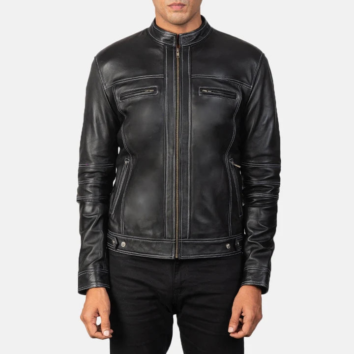 Black leather jacket worn by a person on a white background