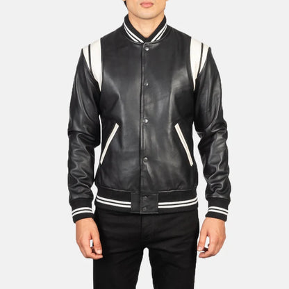 Black leather varsity jacket with white accents on a plain background