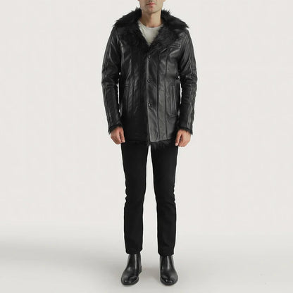Person wearing a black leather jacket with fur collar on a white background