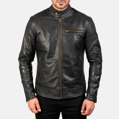 Black leather jacket worn by a person on a white background