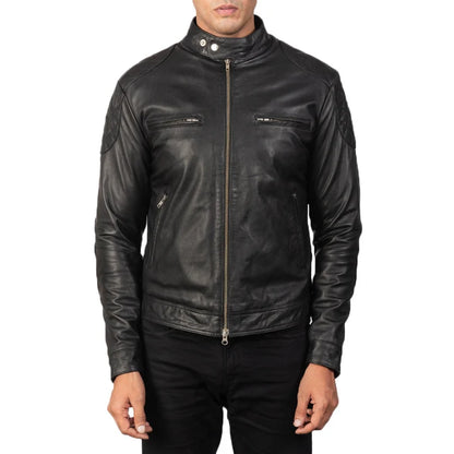 Black leather jacket worn by a person on a white background
