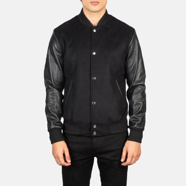 Black jacket with leather sleeves on a white background