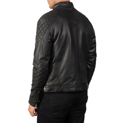 Black leather jacket worn by a person on a white background