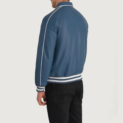 Blue jacket with white piping on a plain background