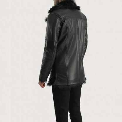 Black leather jacket with fur collar and cuffs on a white background