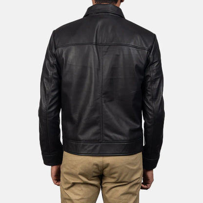 Black leather jacket worn by a person on a white background