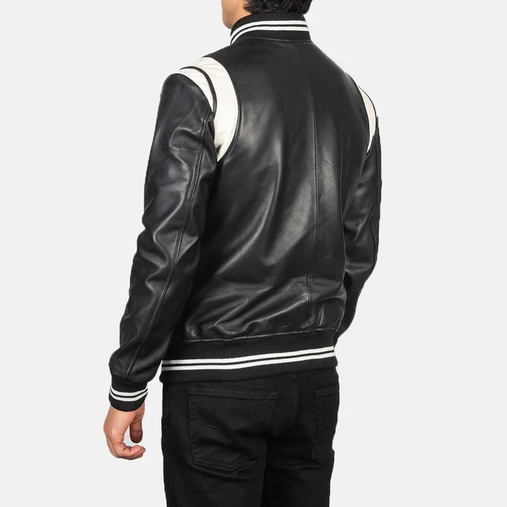 Black leather jacket with white stripes on a plain background
