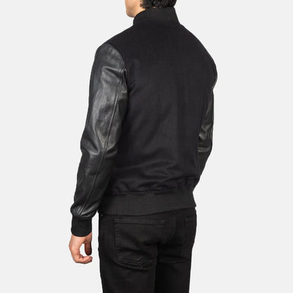 Person wearing a black leather jacket on a white background