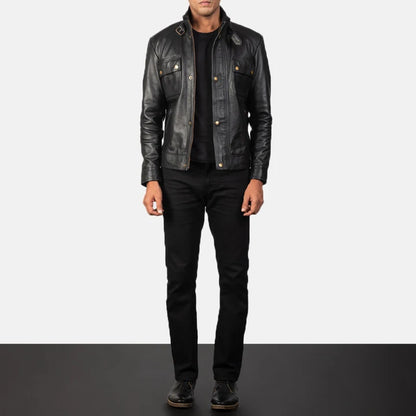 Person wearing a black leather jacket and pants on a white background
