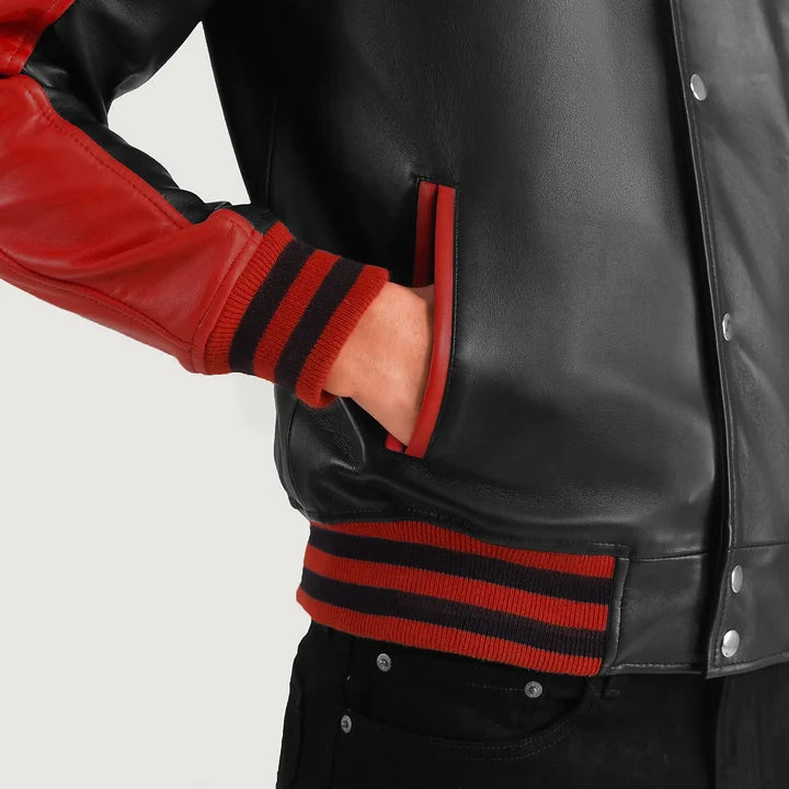 Black leather jacket with red and black striped sleeves on a white background