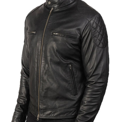 Black leather jacket with quilted shoulder design on a white background