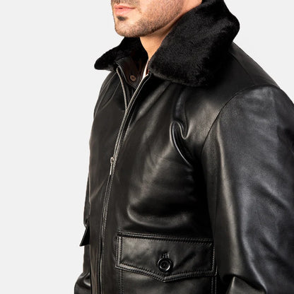 Black leather jacket with fur collar on a white background