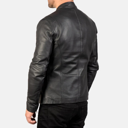 Black leather jacket worn by a person on a white background