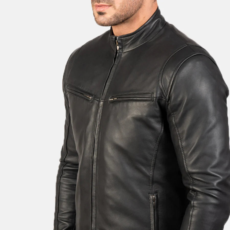 Black leather jacket worn by a person on a white background